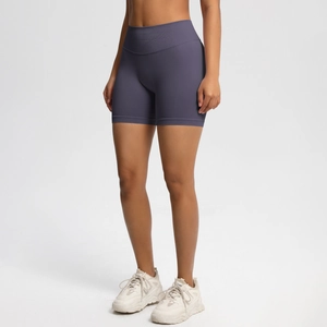 Detail view of high waist seamless yoga shorts with peach butt lift design and grey-purple fabric