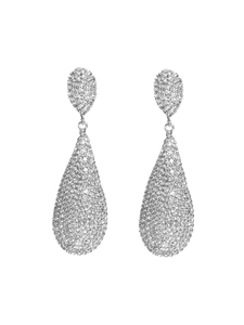 Detailed view of luxury silver drop earrings with shimmering crystals on white background