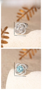 Detailansicht der 8,5 mm Kleeblatt-Ohrstecker mit weißen und blauen Zirkonia-Steinen