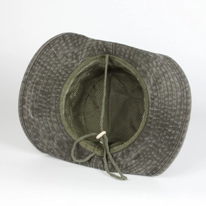 Detail of outdoor sun hat featuring breathable mesh lining and adjustable windproof cord