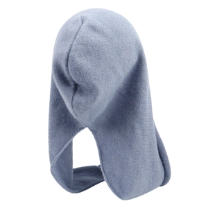 Detail of the light blue knitted hooded scarf showing the dense texture and warm fabric
