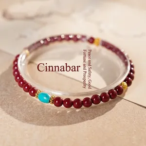 New Chinese style cinnabar bead bracelet with turquoise accents and golden spacers