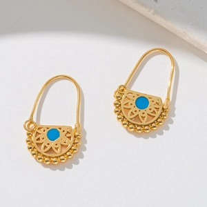 18K gold plated bohemian semi-circle earrings with turquoise stone on white stone background