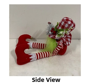 Side view of Christmas elf plush with red plaid hat, green beard and striped long legs