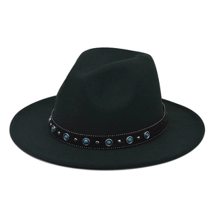 Detail of black wool fedora featuring blue gemstone accents and silver metal studs