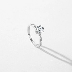 Sparkling S925 sterling silver crown ring with round-cut center diamond and side accents
