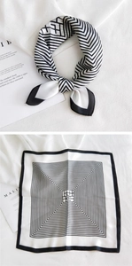 Detailed view of black and white geometric silk scarf with knotted and flat texture shots