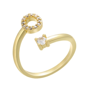 Macro detail of gold adjustable ring with cubic zirconia circle and solitaire diamond
