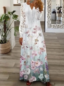 Detail of white lace long sleeves and floral print on long bohemian dress