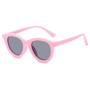 Pink round frame children's sunglasses with dark grey UV protection lenses for outdoor travel