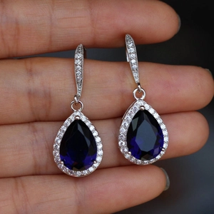 Elegant silver pear-cut teardrop earrings with deep blue sapphire zircon and diamond halo