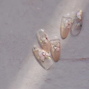 Japanese retro butterfly nail stickers with champagne gold gradient and sparkling rhinestones