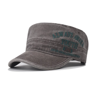 Detail of vintage gray washed canvas military cap with green Youth embroidery