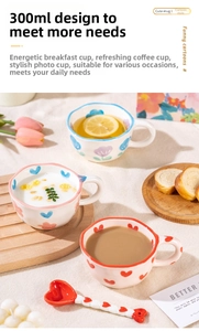 Detailed view of 300ml ceramic mug set with hand-painted floral and heart patterns