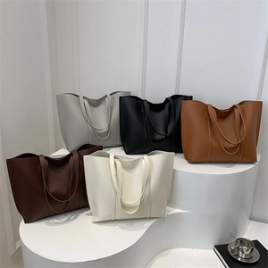 Minimalist large-capacity faux leather tote bags shown in five classic neutral colors