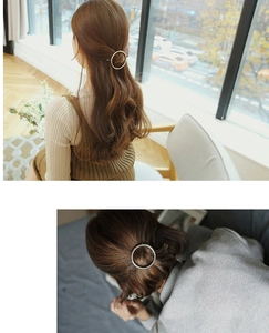 Detailed view of minimalist gold and silver round geometric metal hair clips for women