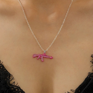 Pink AK-47 rifle pendant necklace with white rhinestones and silver metal chain