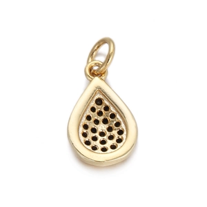 Close-up of golden teardrop pendant with honeycomb cutout design and a circular ring