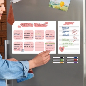 Magnetic weekly planner and to-do list set with 6 markers on a grey metal fridge