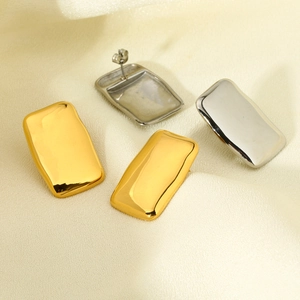 Minimalist rectangular curved stud earrings in polished 18K gold and silver finishes