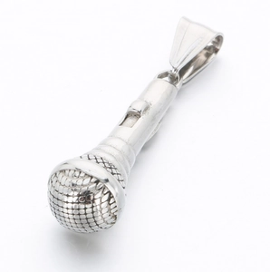 Macro detail of silver microphone pendant with textured grid and polished steel finish