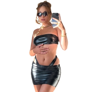 Women's black faux leather two-piece set featuring a tube top and cutout mini skirt