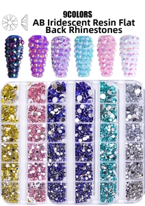 Detail view of 9-color flatback resin nail rhinestones in a clear storage box