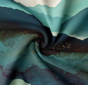 Detail of mountain scenery wall tapestry with soft fabric texture and artistic patterns