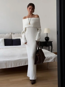 Elegant off-shoulder white knit maxi dress with long sleeves and slim fit design