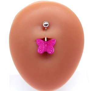 Cute pink butterfly belly button ring in silver-tone metal on a realistic model