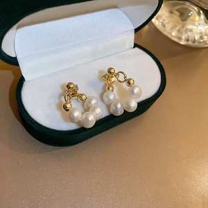 French vintage round pearl earrings with gold metal in green velvet jewelry box