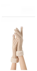Close-up of touchscreen fingertips and plush faux fur trim on warm winter gloves
