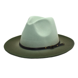 Detail of gradient fedora hat showing mint crown and olive brim with gold stud leather band
