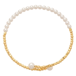 Elegant spiral wrap bracelet featuring white pearls and gold faceted beads in a layered design