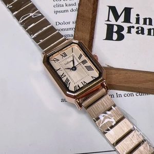 Vintage women's quartz watch with rose gold octagonal case and roman numeral dial