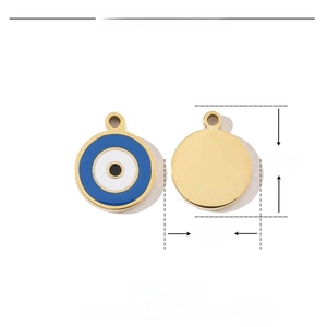 Detailed macro view of 13mm gold stainless steel evil eye pendant with enamel inlay