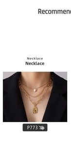 Detailed view of layered gold necklace with pearl and portrait relief medallion pendants