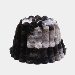 Close-up of thick tie-dye plush fabric texture on winter bucket hat for women