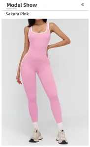 Detail view of cherry blossom pink yoga jumpsuit with white contrast trim and square neckline