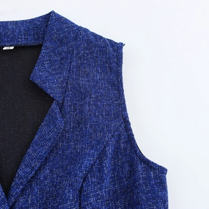 Women's blue tweed sleeveless two-piece set featuring a notched lapel vest and texture