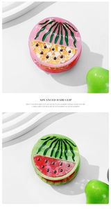 Detail of creative watermelon claw clip with translucent jelly texture and seed accents