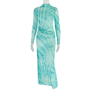 Detail view of the drawstring ruched waist on a blue and green mesh printed dress