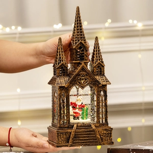 Vintage bronze Christmas church snow globe lantern with Santa Claus and sparkling glitter