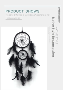 Detail view of black double-ring Indian style dream catcher with feathers and beads