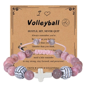 Pink zebra stone volleyball bracelet with a cross charm on an inspirational gift card
