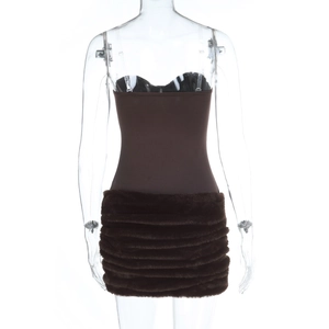 Detail of dark brown mini dress featuring sleek tube top and multi-layered faux fur hem