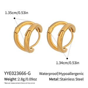 Detailed view of 18k gold plated double C-shaped earrings with size and weight specs
