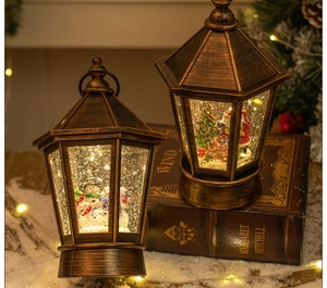 Close-up of vintage Christmas lanterns with Santa scenes and warm LED glitter snow effects