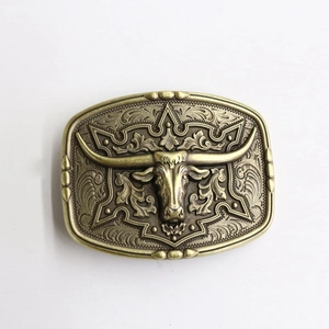 Retro golden bull skull belt buckle with Western cowboy style floral relief patterns