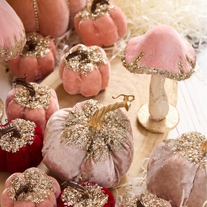 Velvet mushroom and pumpkin decor with gold sequins for festive tabletop display